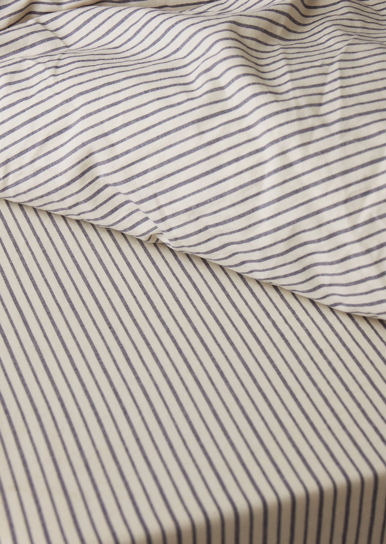 Pyjama Stripe Cotton Fitted Sheet | Navy/Ecru - Image 3