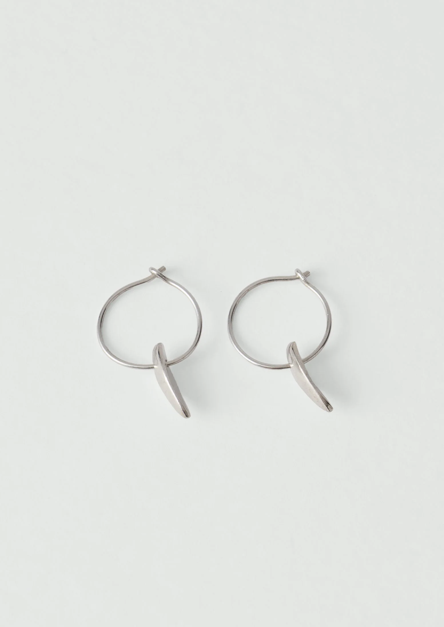 Sally Lacock Sculpted Seed Charm Hoops | Silver